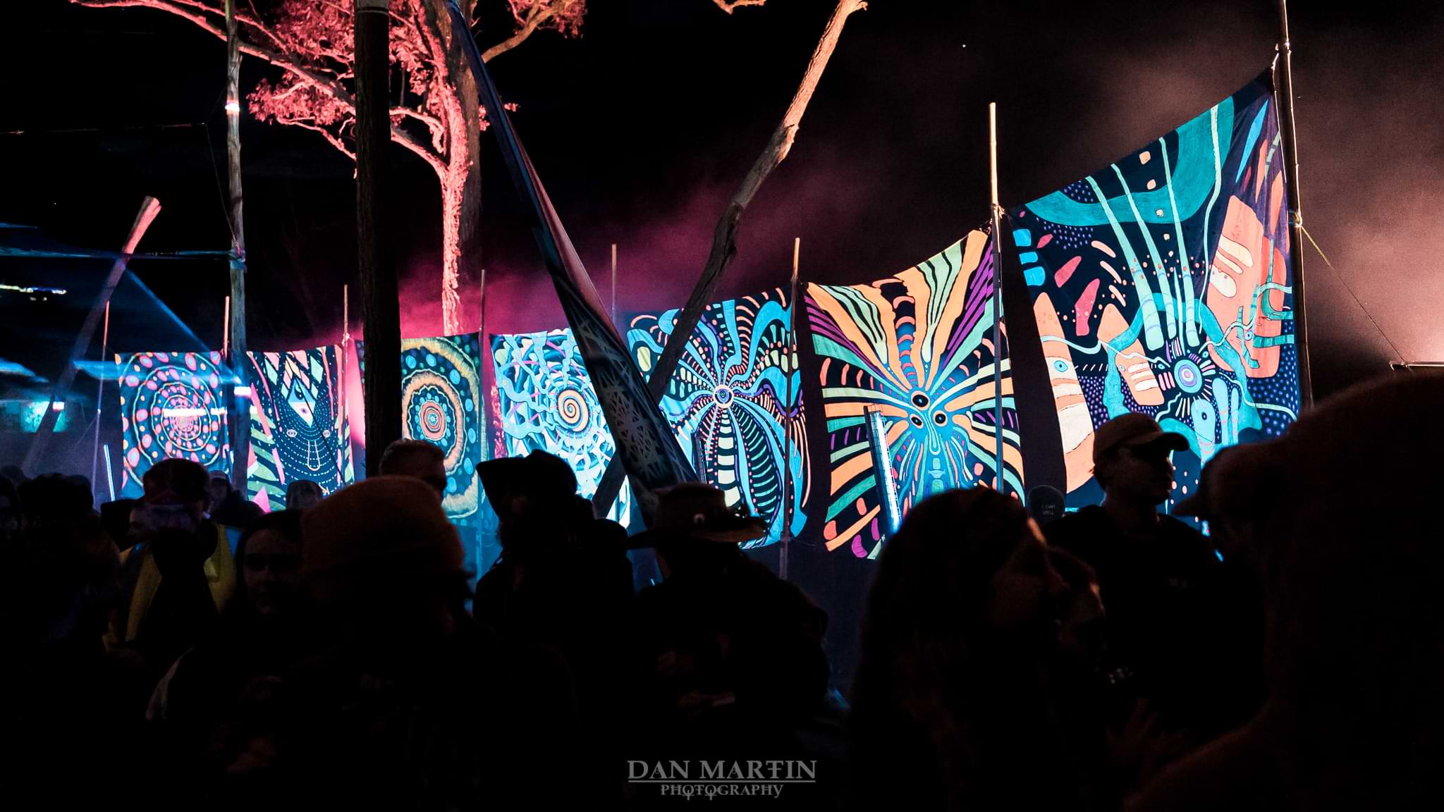 UV-lit banners at a creative installation